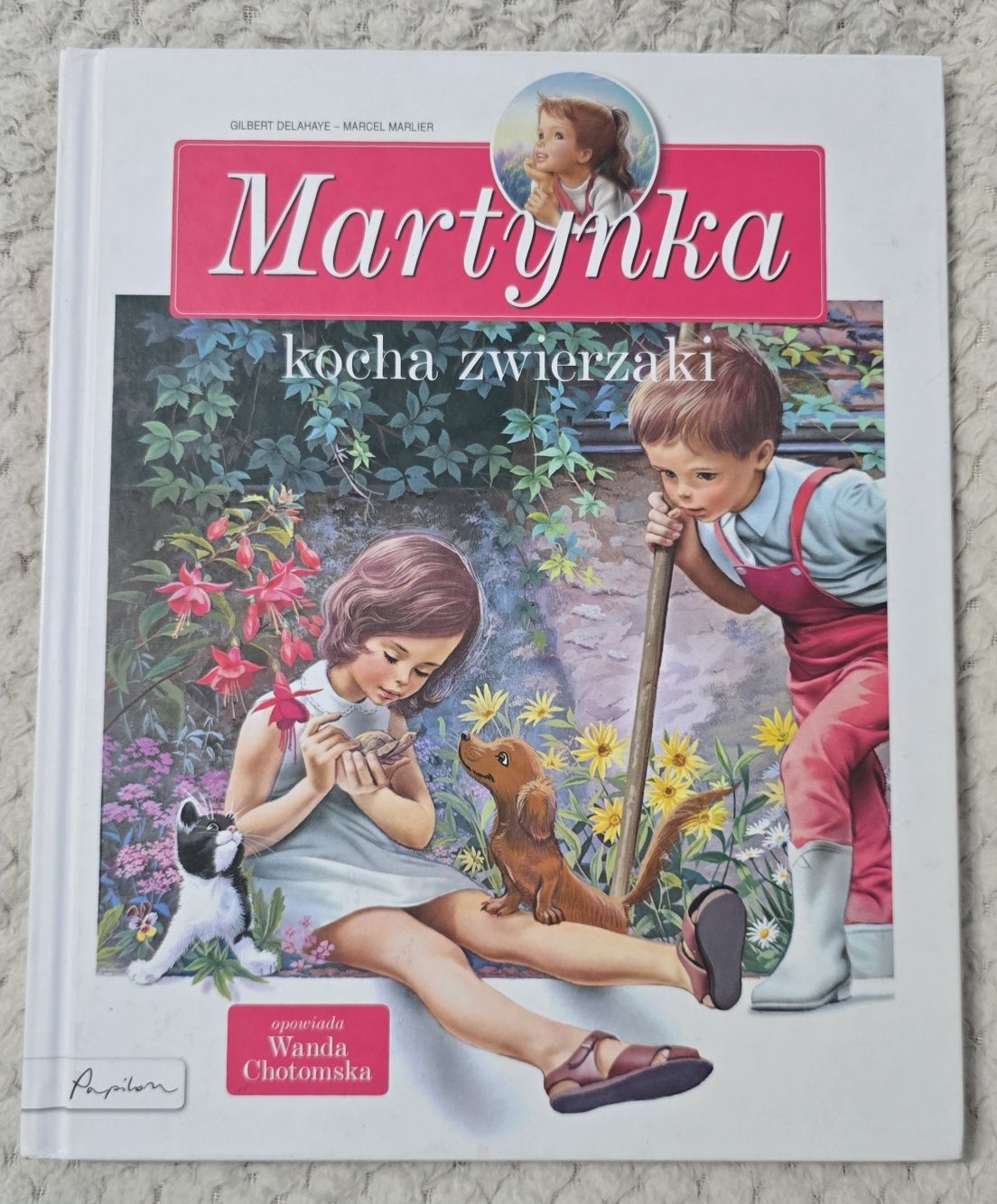 Książka Martynka kocha zwierzaki.  
Okładka twarda.