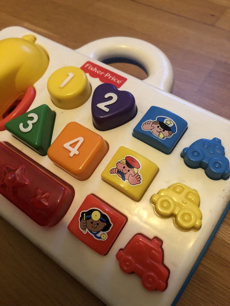 Fisher Price telefon z bazą gra i mówi