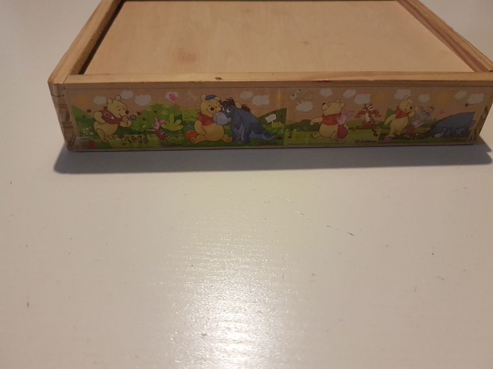 Drewniane klasyczne puzzle z kubusiem puchatkiem