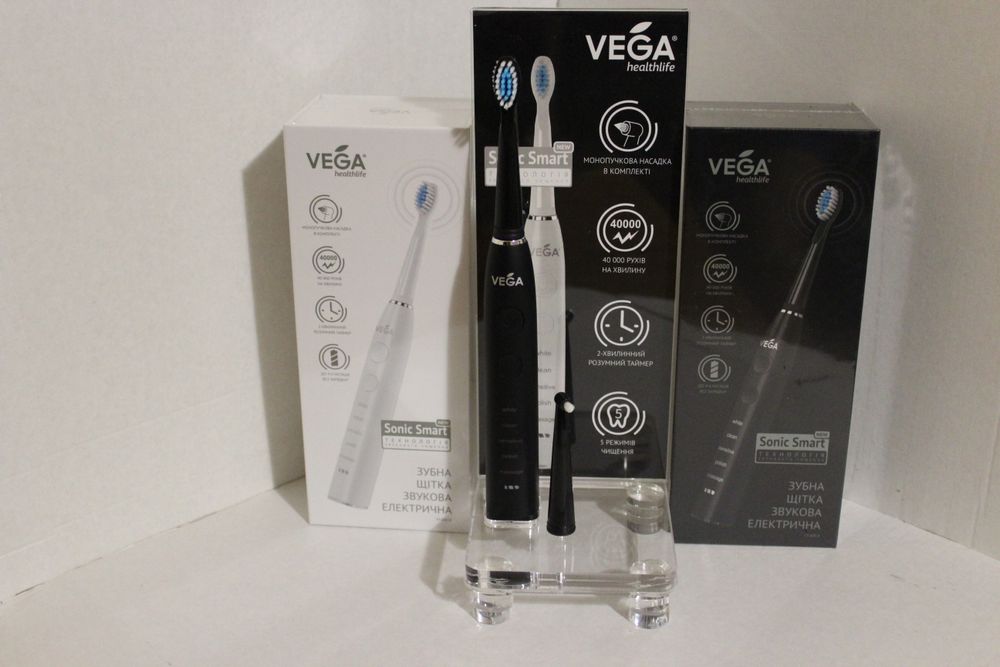 Зубна щітка електрична Vega VT-600 біла  та сорнаг