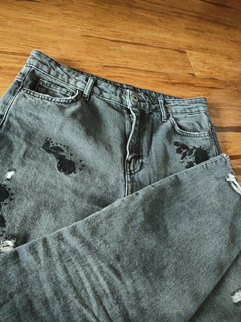 Cygaretki jeansy z przetarciami Bershka 38