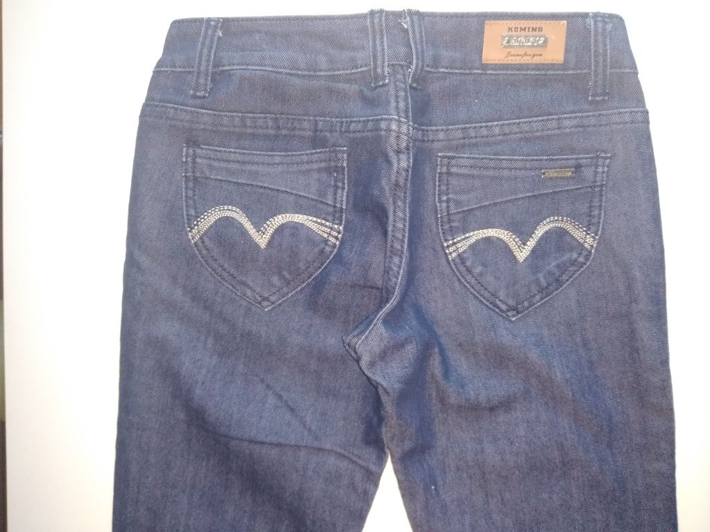 Nowe jeansy r.164