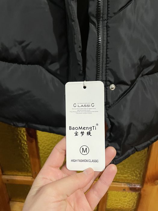 Пуховик зимовий жіночий