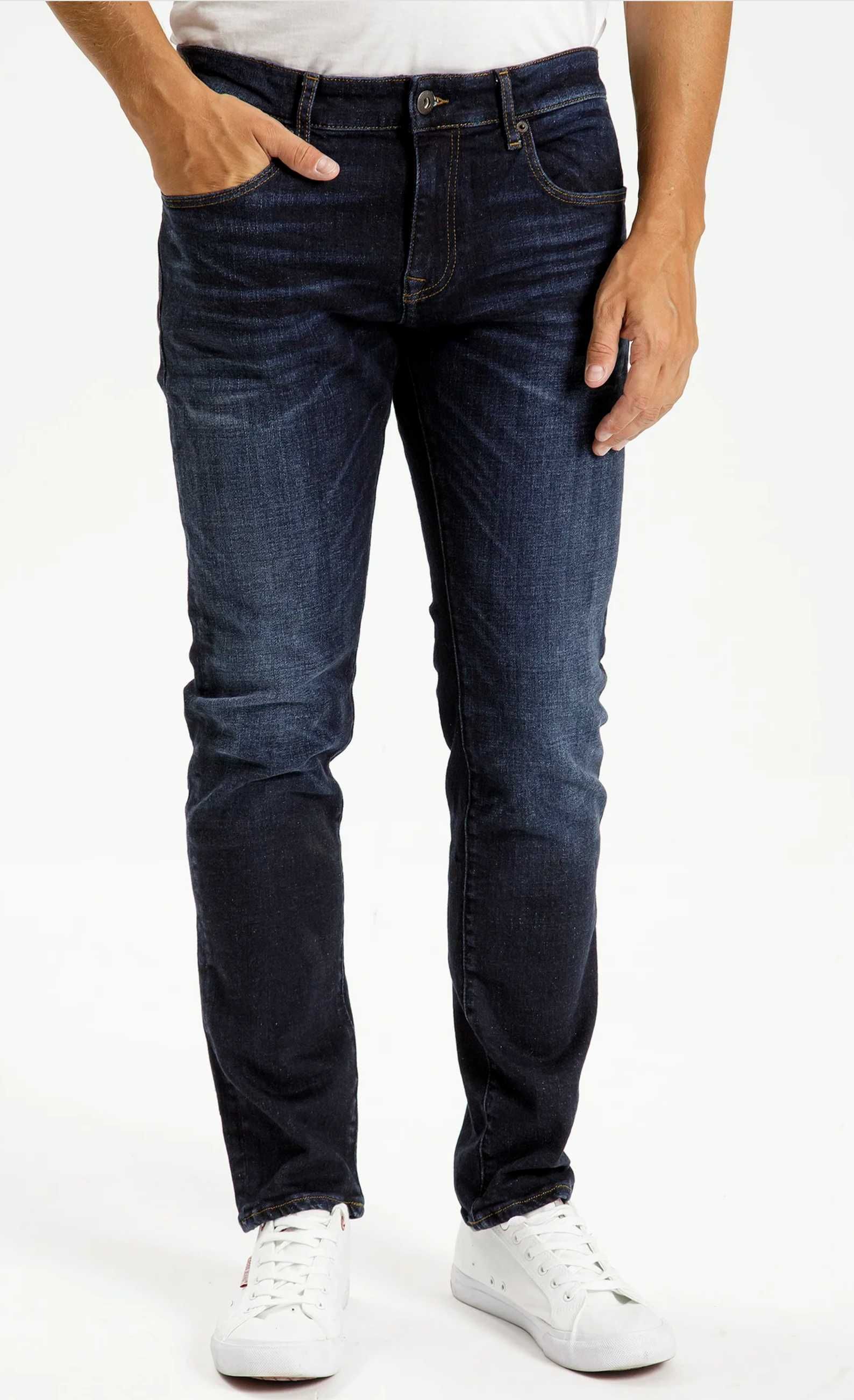 Cross Jeansy F 152-125 Niebieski Tapered Leg W32 L34