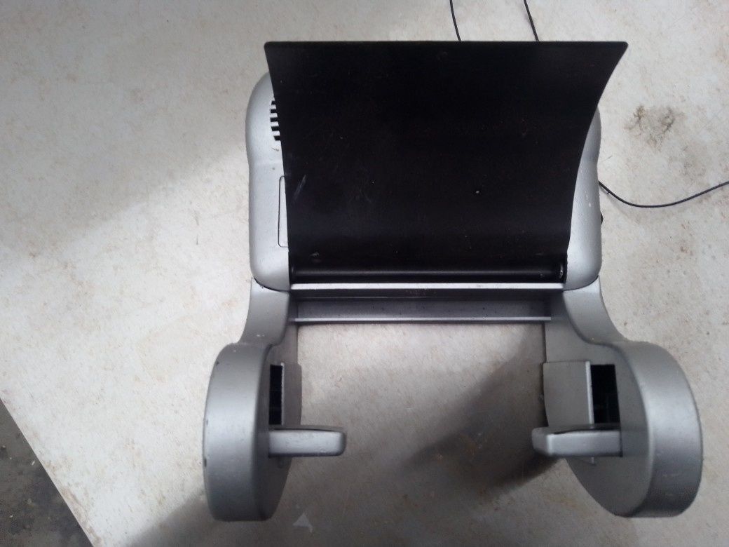 Rádio analógico com suporte de papel higiénico