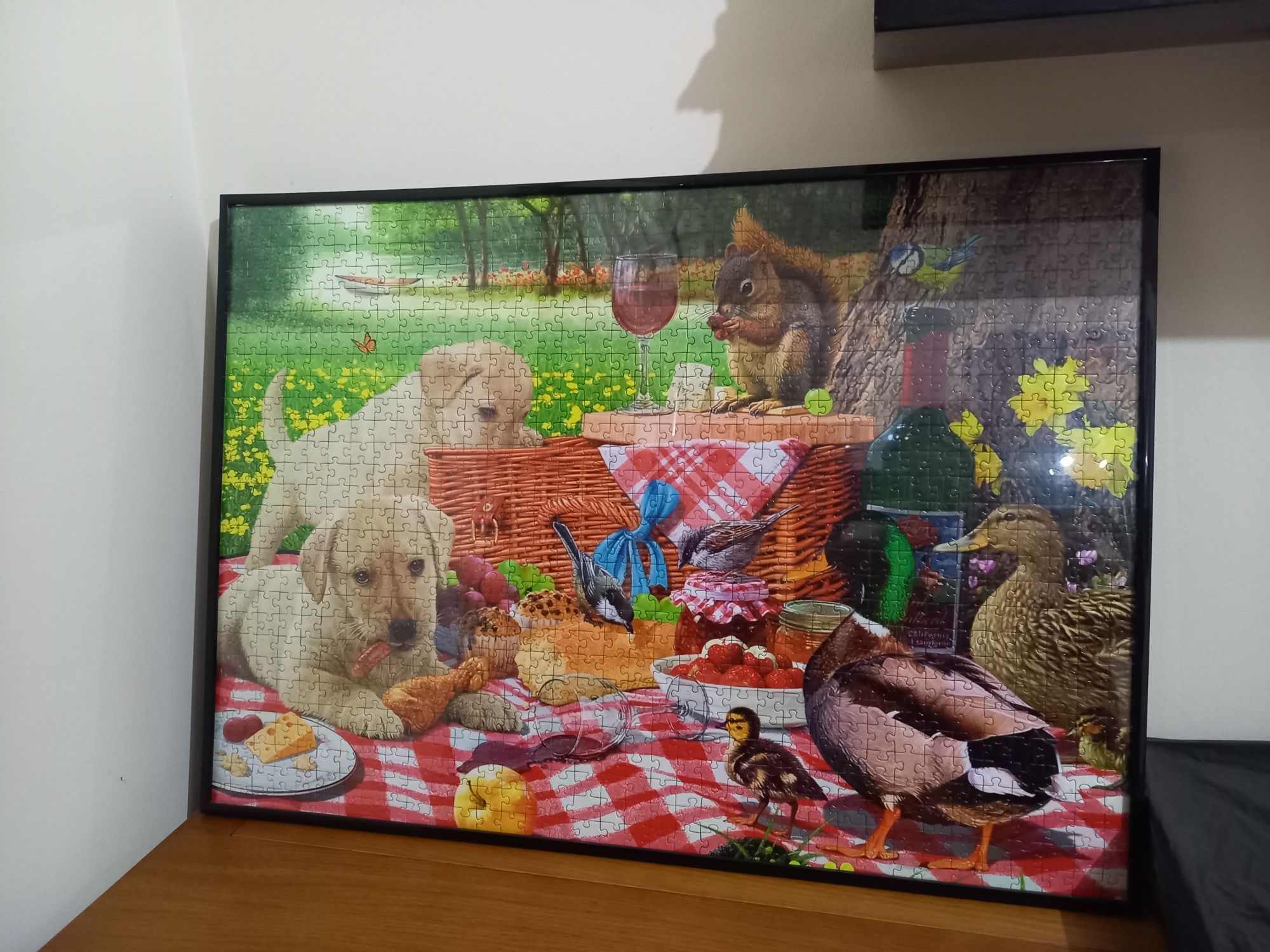 Moldura com puzzle de 1000 peças.
