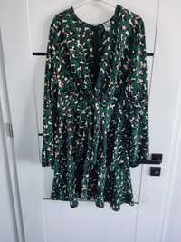 Zielona sukienka panterka z falbankami