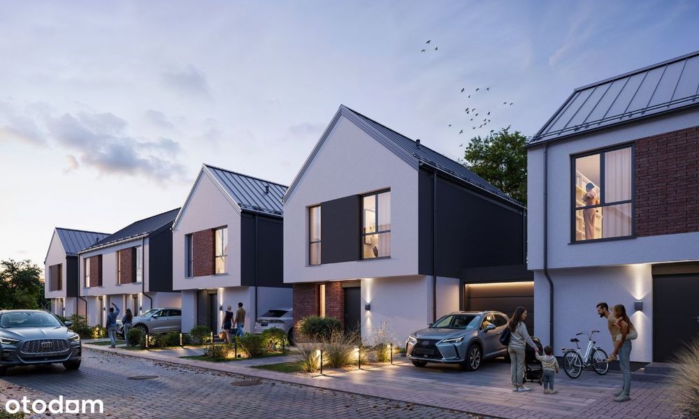 Domy wolnostojące połączone garażami.