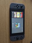 Conjunto Nintendo switch com vários acessórios oficiais