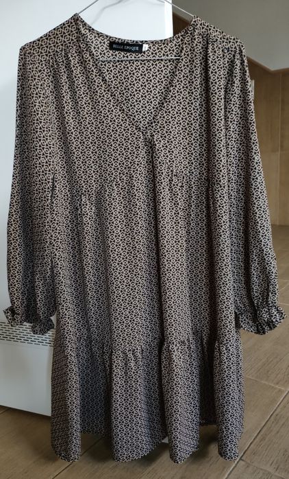 Vestido com tons dourados