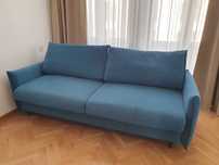 Rozkładana sofa z pojemnikiem na pościel