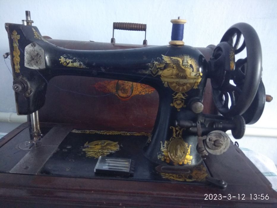 Швейна машинка Singer