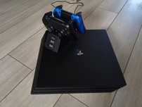 PlayStation 4 Pro 1TB + 2 pady + ładowarka + 9 gier