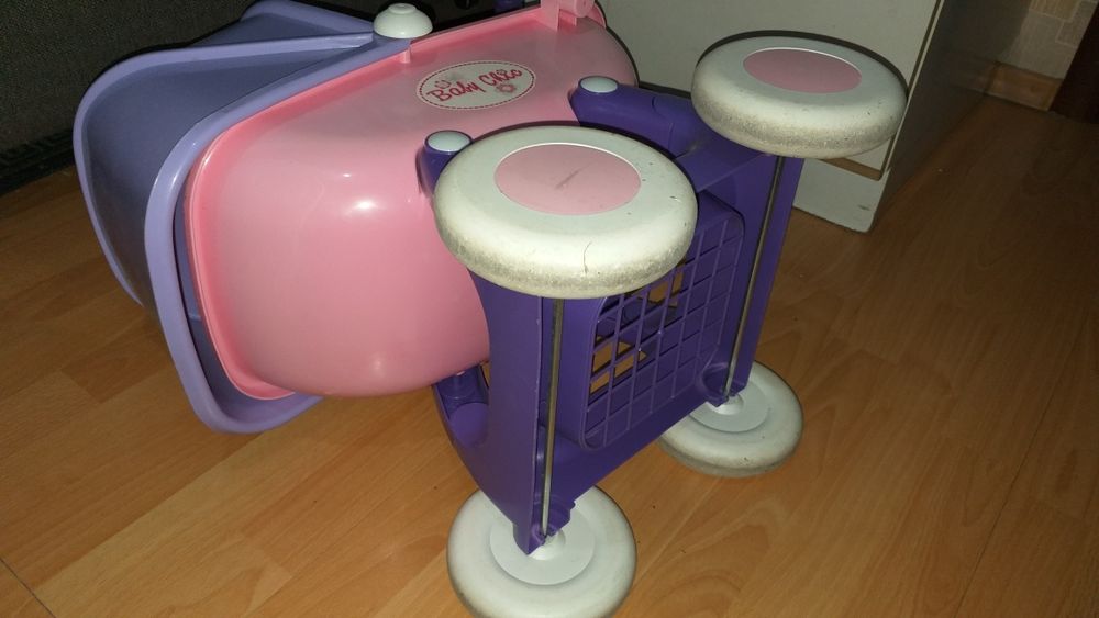 Детская игрушечная коляска