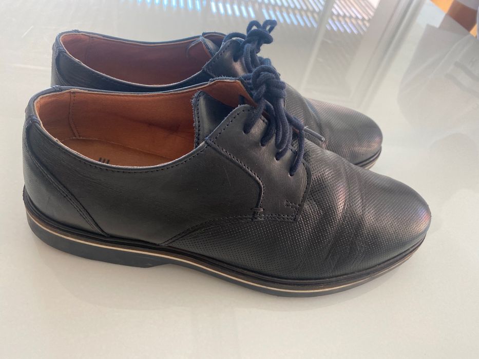 Calçado clássico de homem