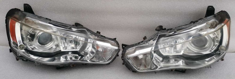 Фара фары левая правая Mitsubishi Outlander XL оригинал ксенон