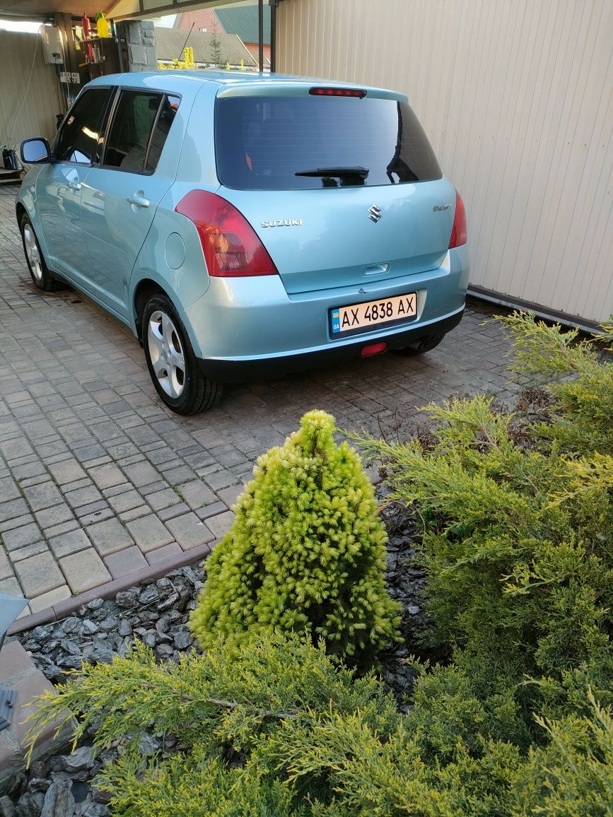 Suzuki Swift 2007,  1,3, robot