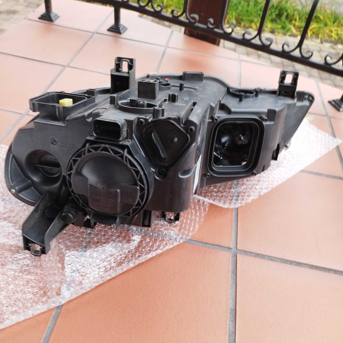 Lampy ksenonowe adaptacyjne  Bmw X5 E70 LIFT - z USA