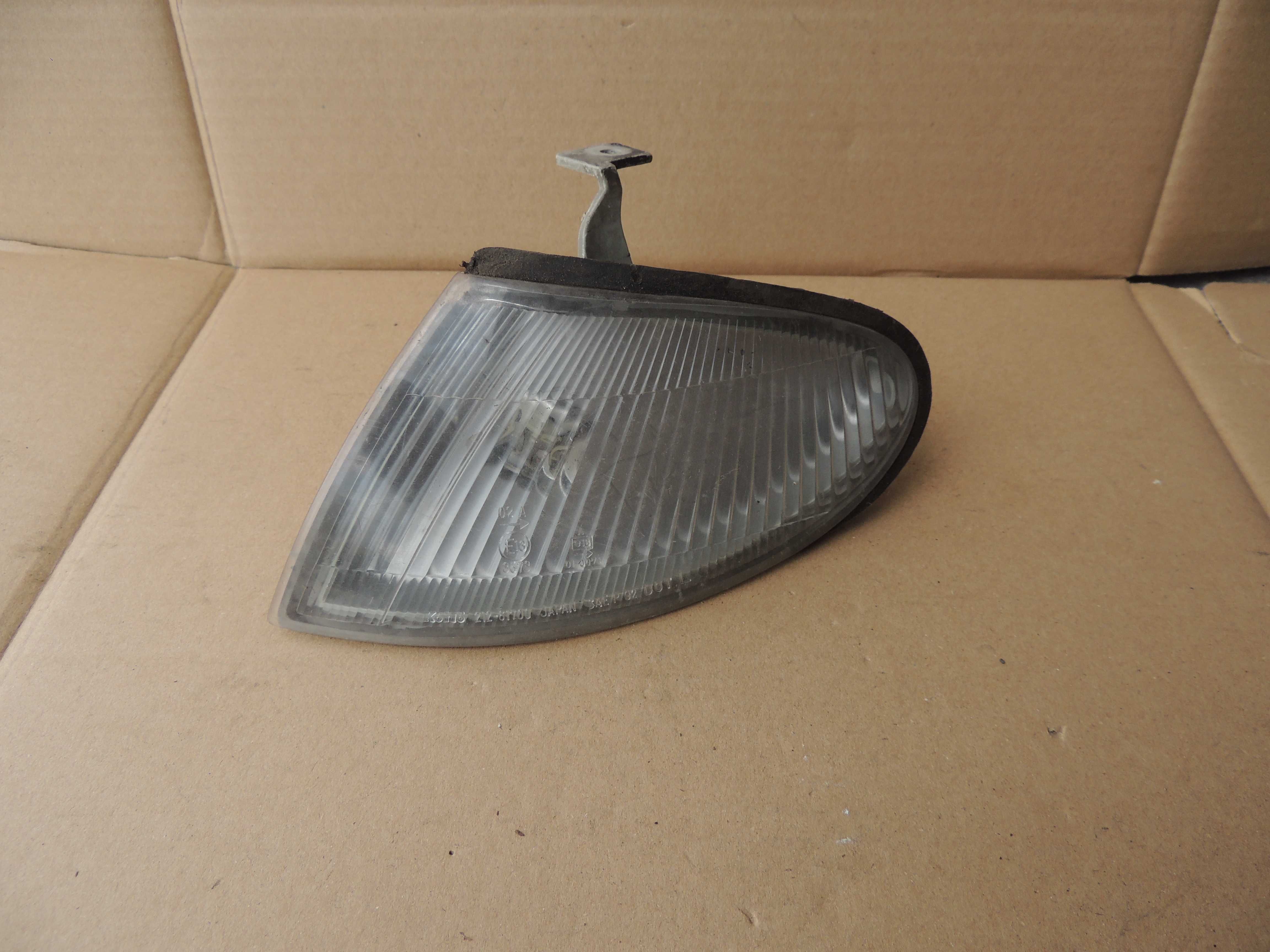 Lampa pozycyjna postojowa lewa Mazda 323S 323 S SEDAN BA 94-98