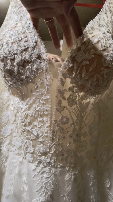 Śmietankowa suknia ślubna