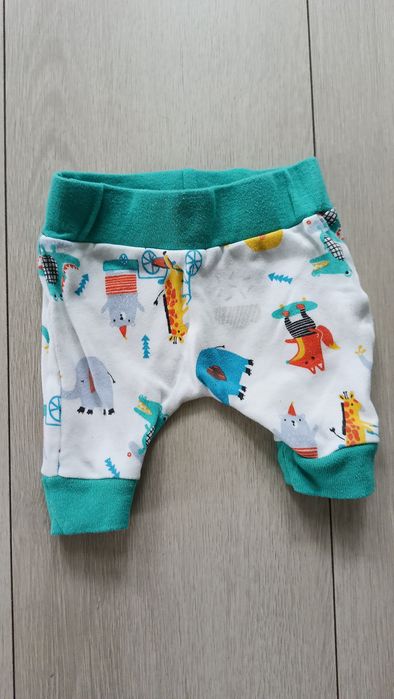 Zestaw ubranek pajacyk śpioszki spodnie 50