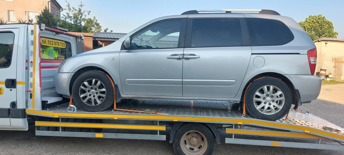 Pomoc drogowa, autolaweta, laweta, transport maszyn i pojazdów