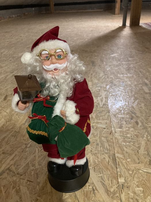 Interaktywny Mikołaj świecący grający