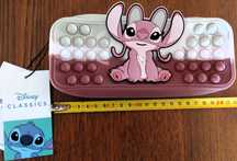 Bolsa Escolar Pop-it Stitch Silicone DIsney Lefties