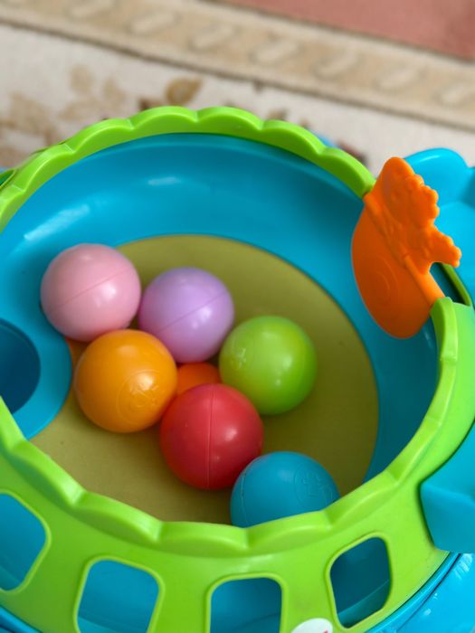 Музыкальный динозавр "Веселые шарики", Fisher-Price