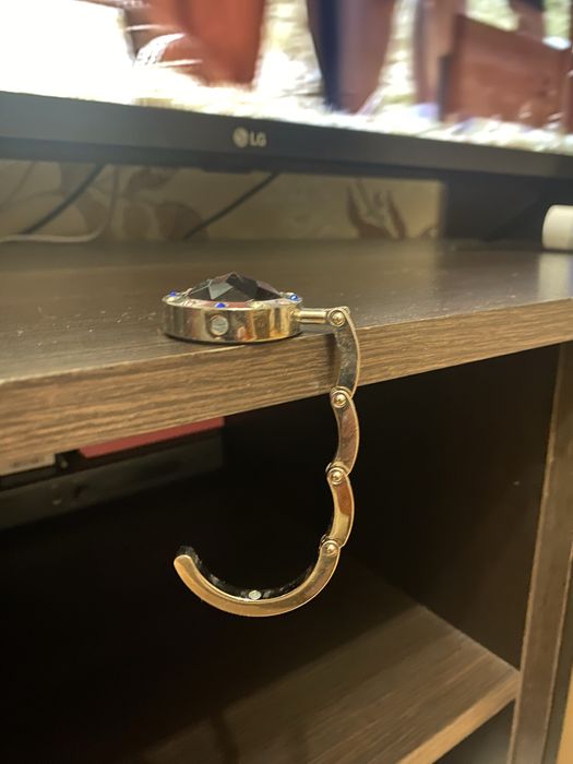 Компактний сумкотримач