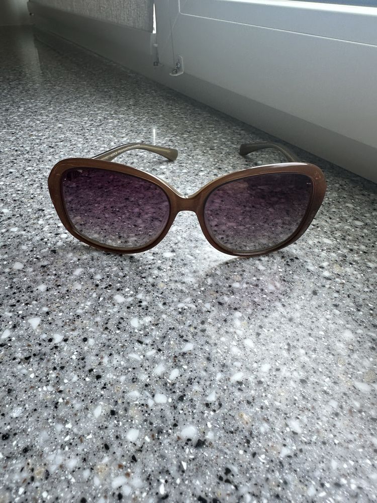 Сонцезахисні окуляри Polaroid