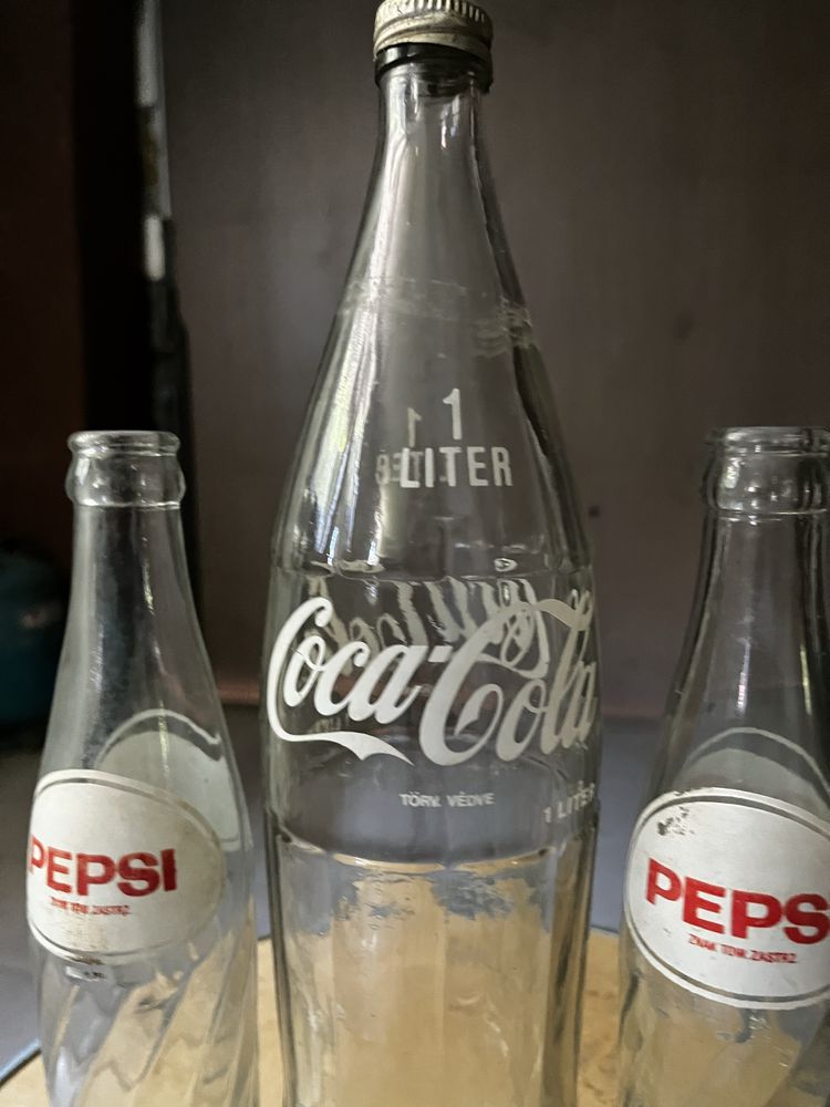 Butelki coca cola, pepsi cola