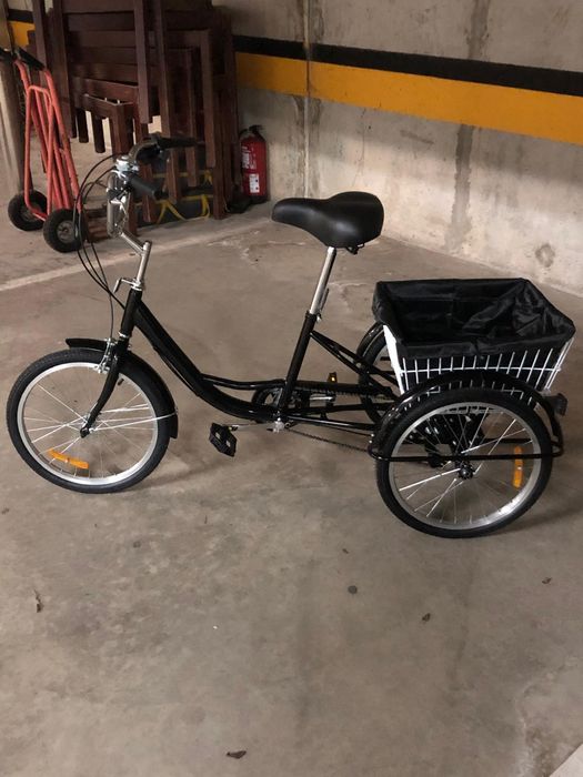 Triciclo com bagageiro que cabe ate 50 k