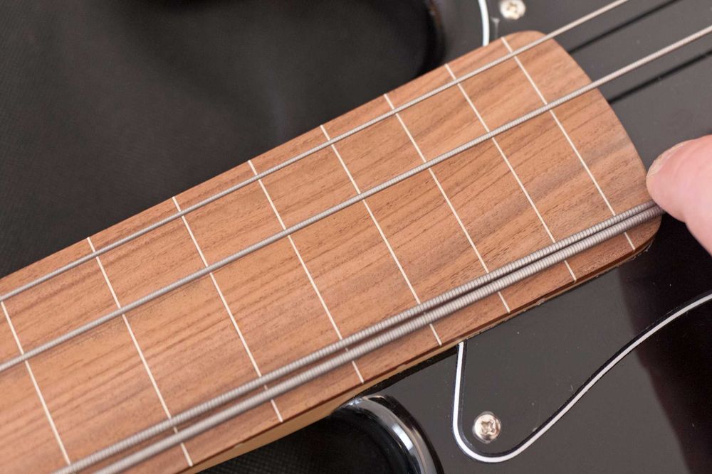 Fender/Squier Jazz Bass Fretless + Saco Fender