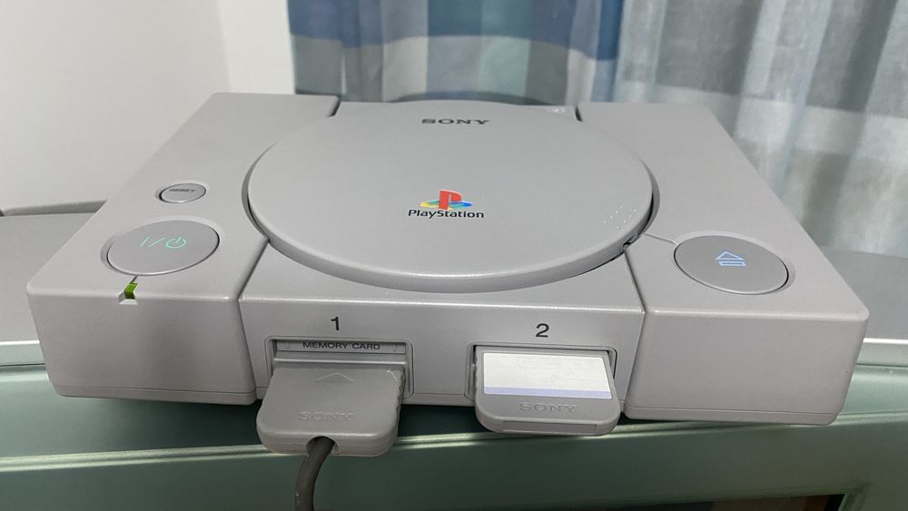 Playstation ps one + jogos e comandos