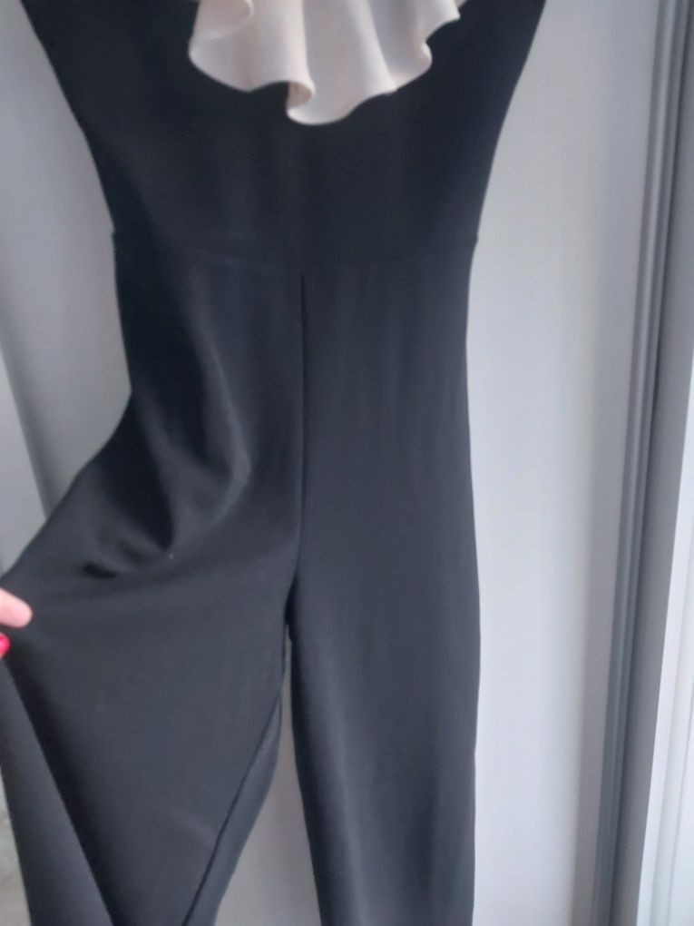 Kombinezon czarny z białą falbanką H&M elegancki