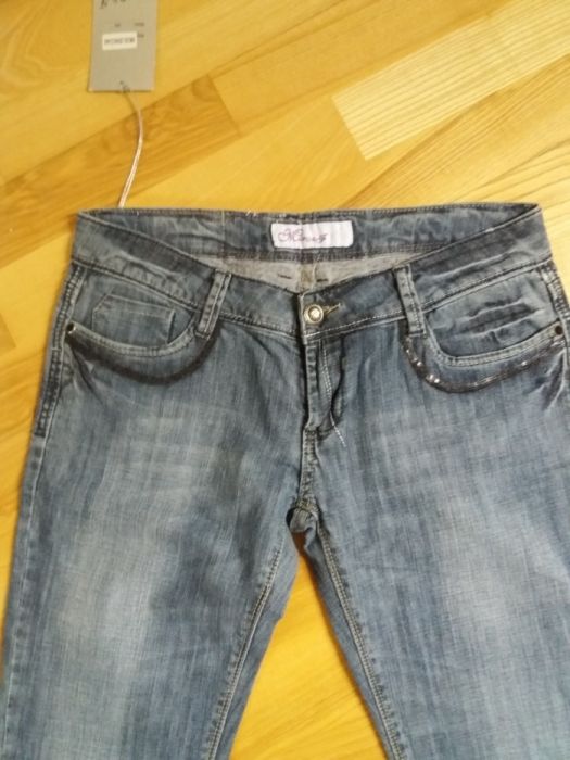 szare jeansy biodrowki dzwony L 40 na wysoka