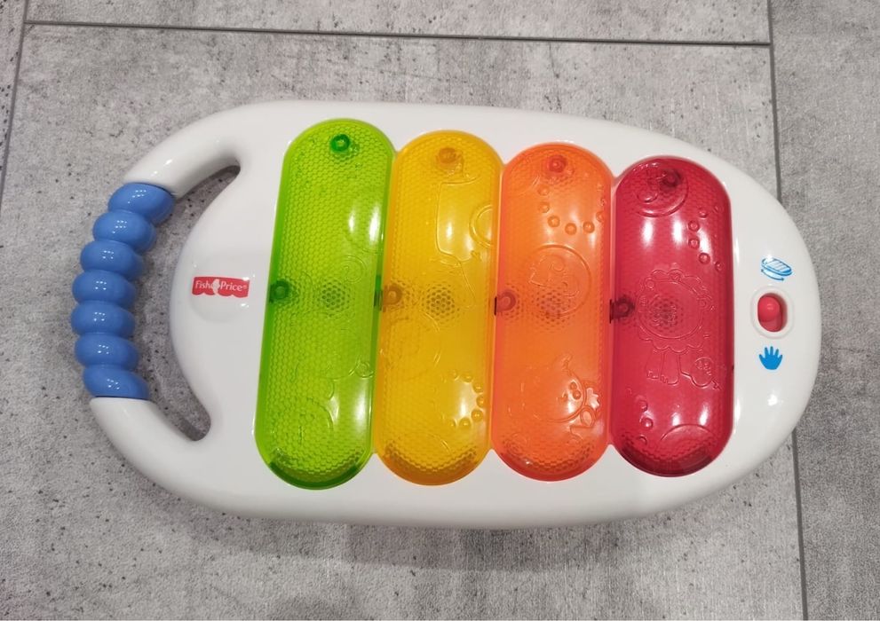 Музичні розвивальні іграшкі Fisher Price