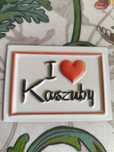 Magnes na lodówkę z napisem "I love Kaszuby"