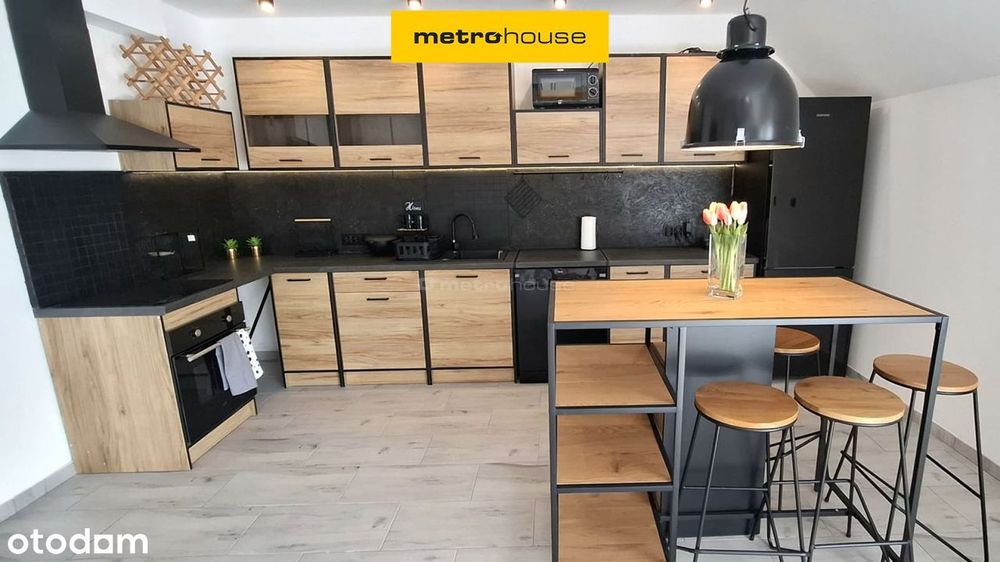 **Dwupoziomowy apartament z parkingiem i ogrodem**