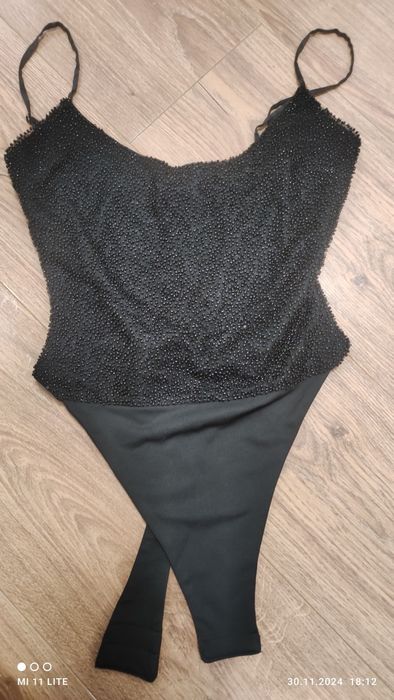 Елегантне жіноче боді