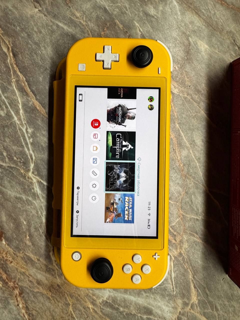 Продам обменяю Nintendo Switch Lite + игры