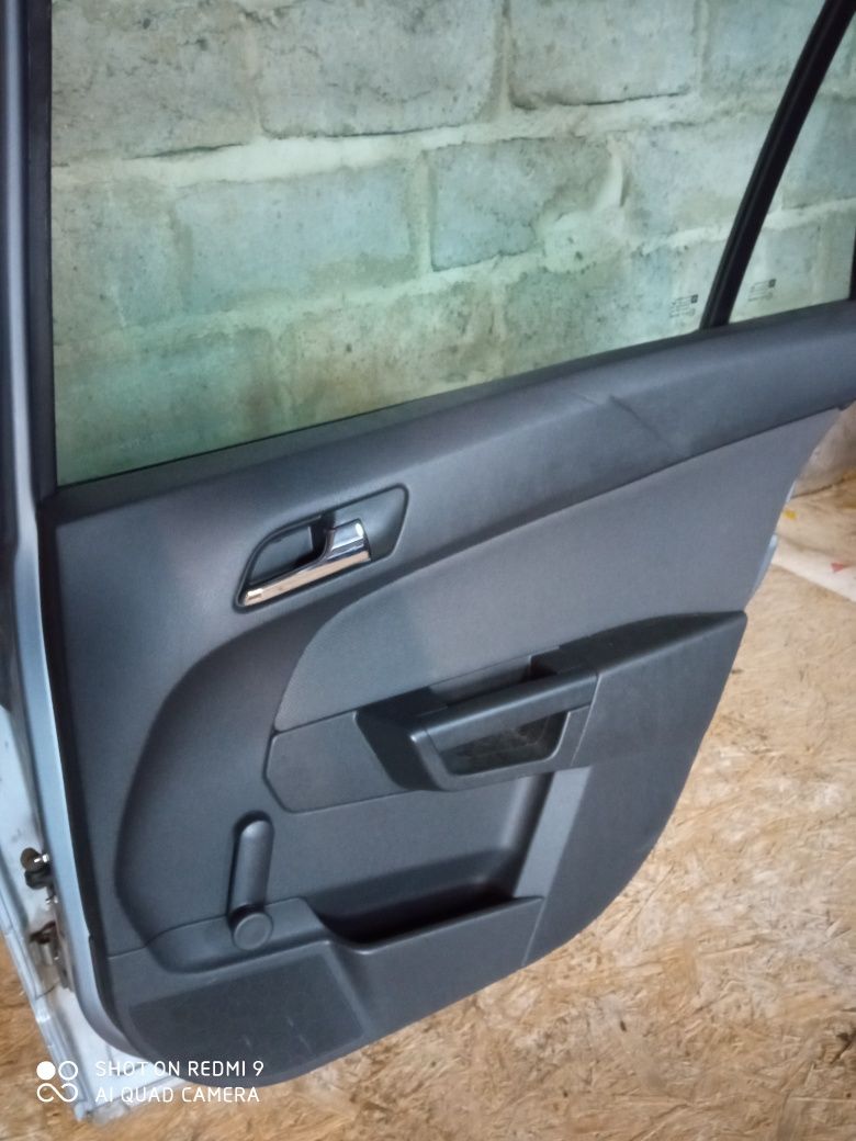 Mechanizm podnoszenia szyby prawy tył manualny Opel Astra III H kombi