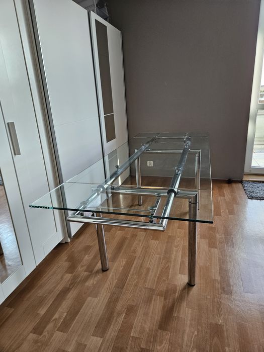 Stół szklany rozkładany 140/200x80 plus krzesła stal/drewno 6szt.