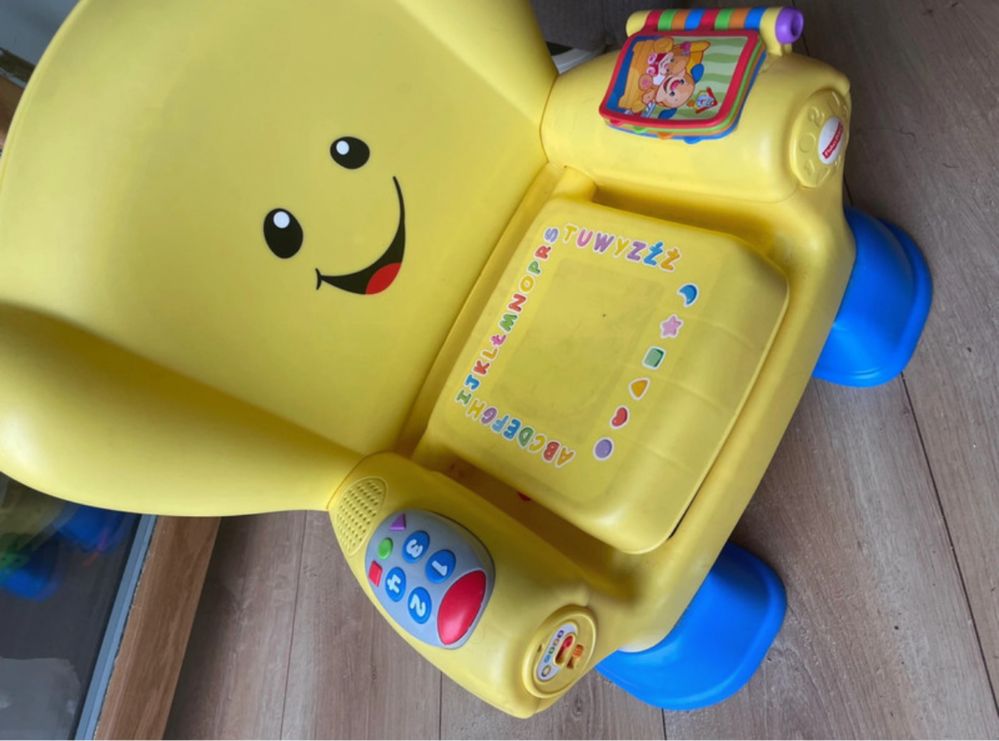 Krzesełko grające Fisher Price