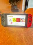 Nintendo Switch + Comando sem fio + Fifa 23 + Mario Kart