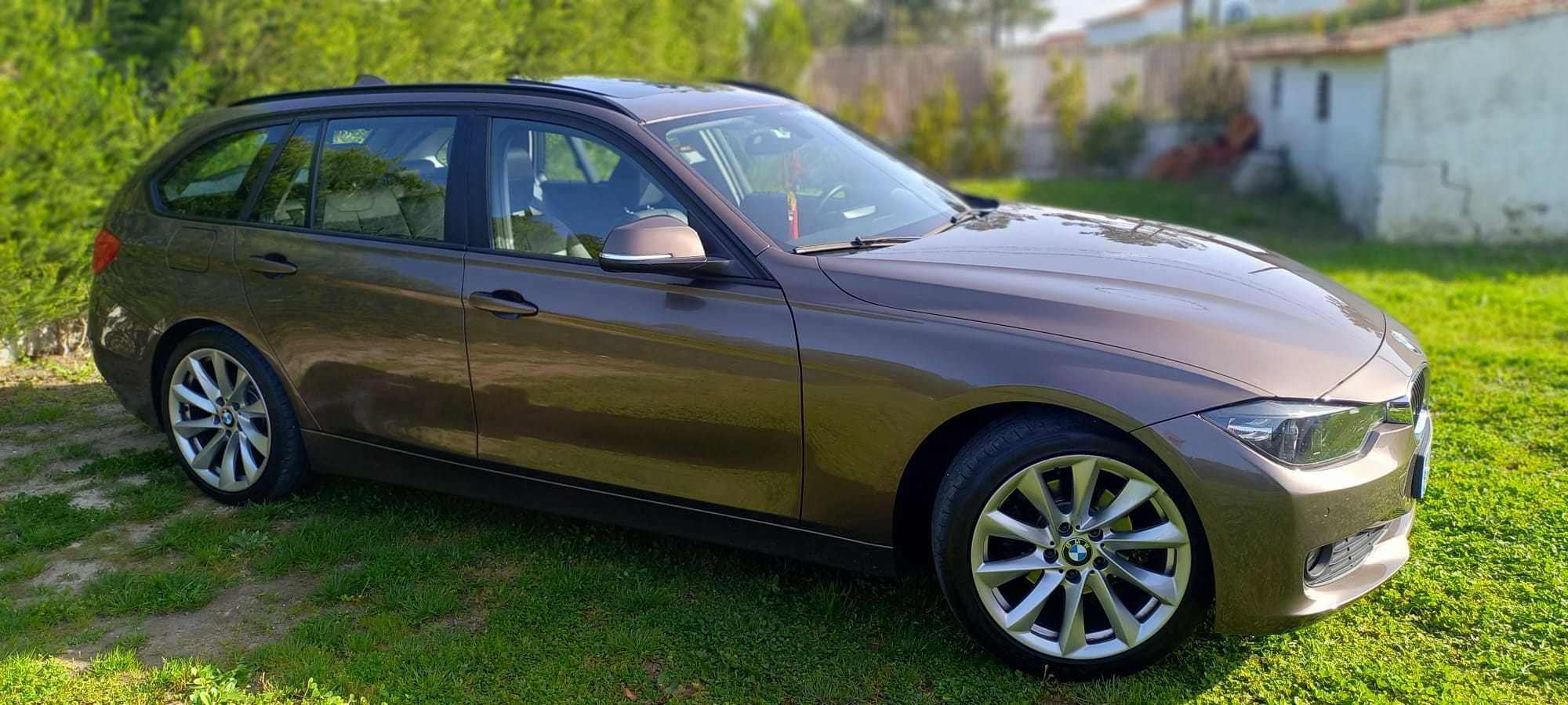 BMW 318 d Efficient Dynamics com teto de abrir completa