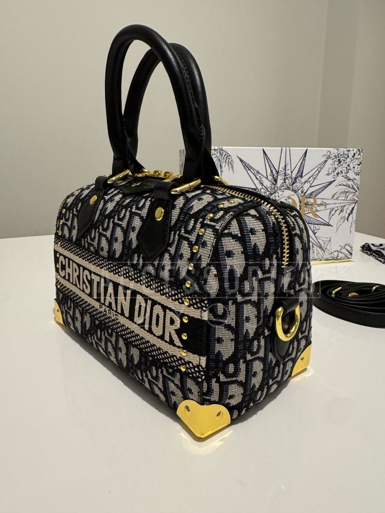 Mala       Dior