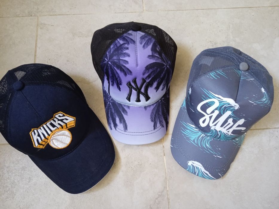 Кепки різні, нові, значна частина сітка ззаду