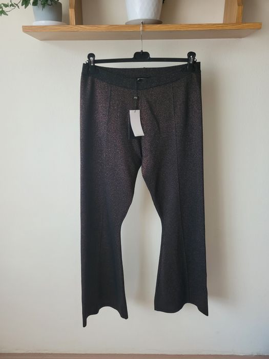 Brązowe czarne spodnie dzwony na imprezę święta